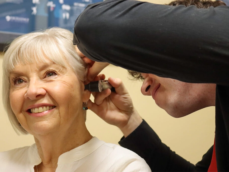 Dr Bureau with patient